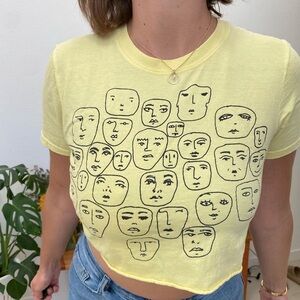 Urban outfitters “faces” super cropped yellow t shirt